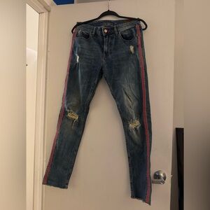 Stylish Blue Jeans with Red Trim Accent